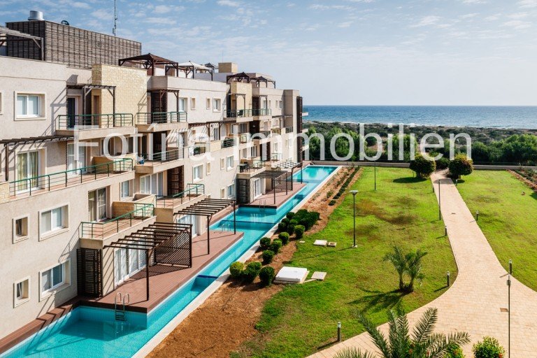 9 Bafra, Iskele - Famagusta Etagenwohnung 1+1 Apartments im RESORT-PROJEKT - DIREKT AM SANDSTRAND-T�RKISCHE TITEL-TOP-Infrastruktur!