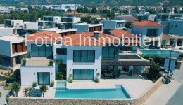 Hauptbild Ikonische Designer-5+1-Villa mit Strandzugang, Infinity-Pool und Meerblick - am Korineum Golf Club !